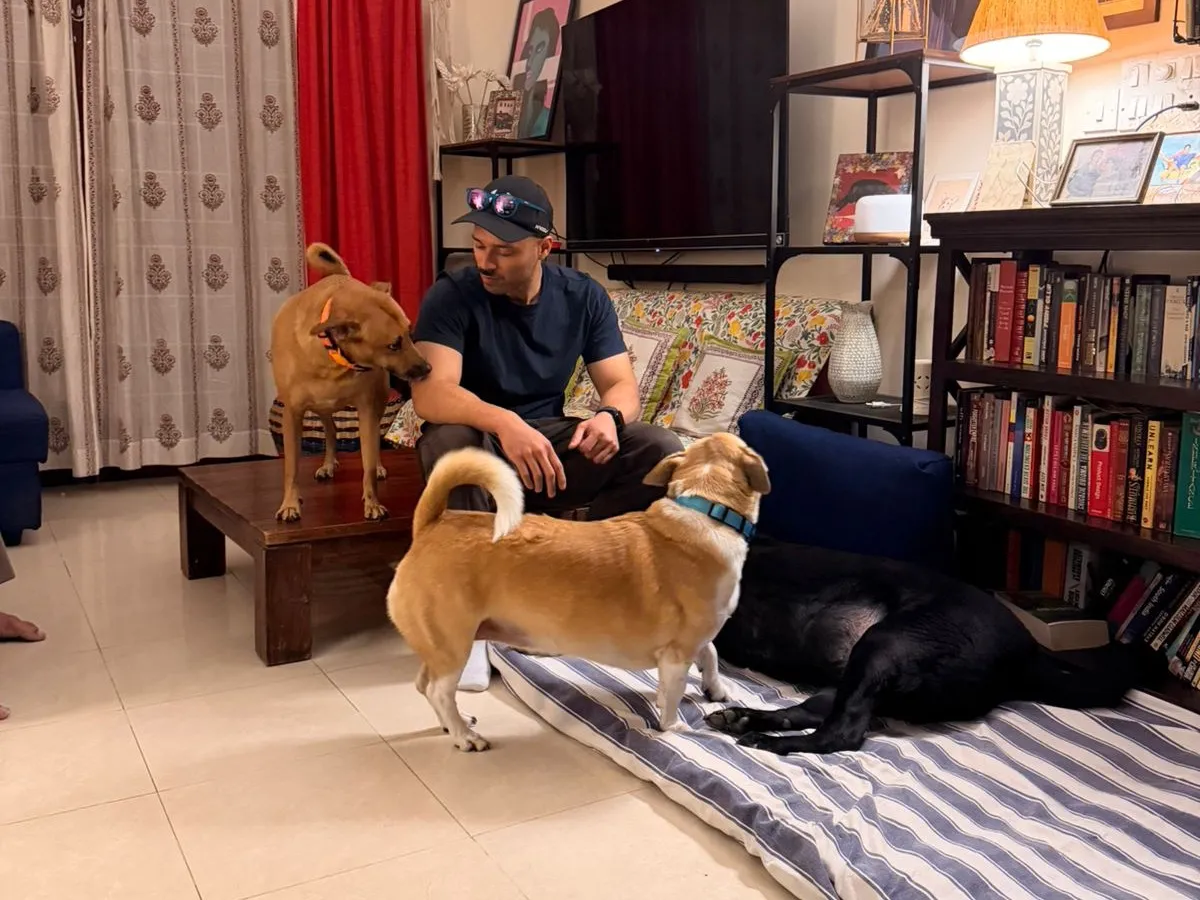 Sandesh at home with his three dogs